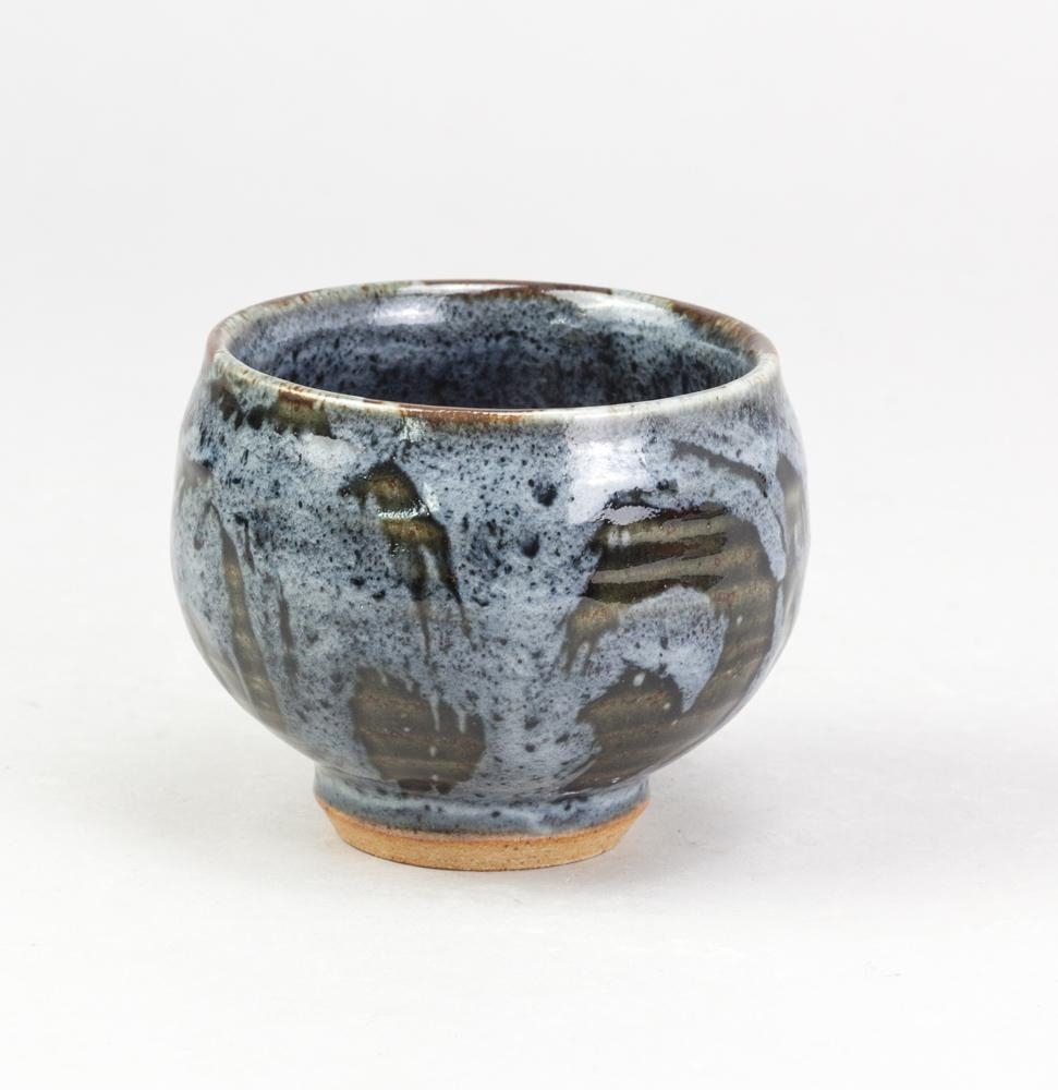Nick Rees | a stoneware yunomi covered in dark green glaze with blue ...