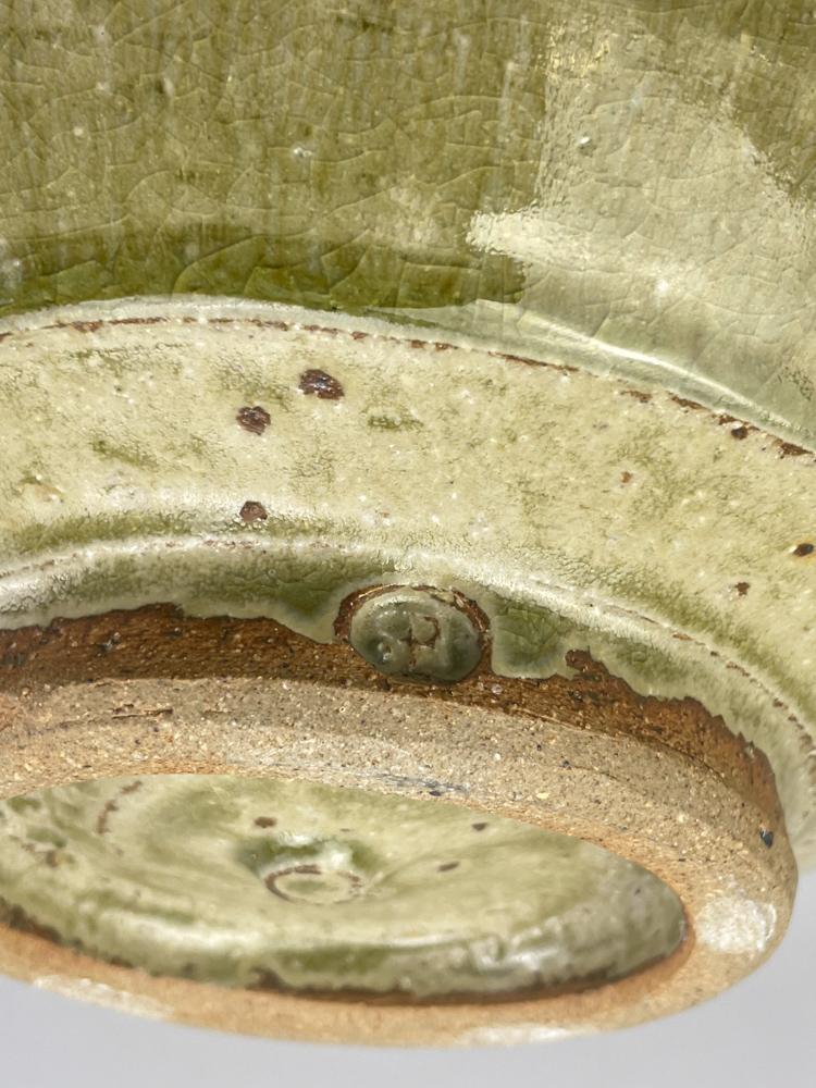 Phil Rogers | a stoneware footed bowl covered in green ash glaze with ...