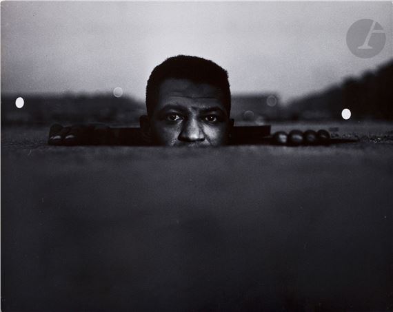 Emerging Man (from the Invisible Man series) by Gordon Parks, 1952