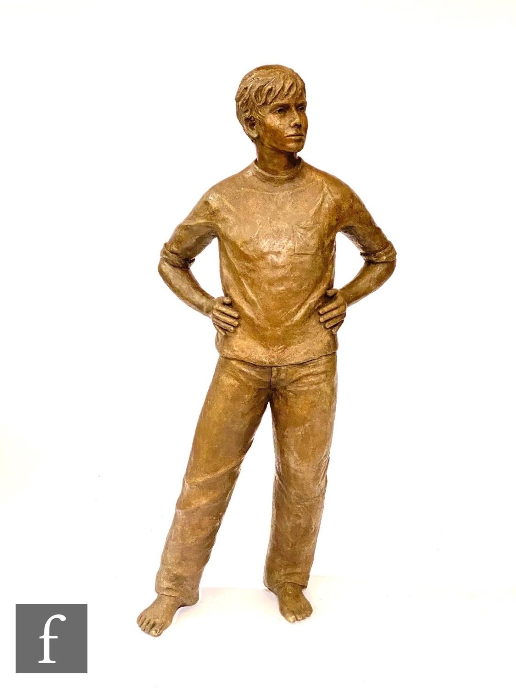 Ann Hogben Life size statue of a standing boy with hand on hip