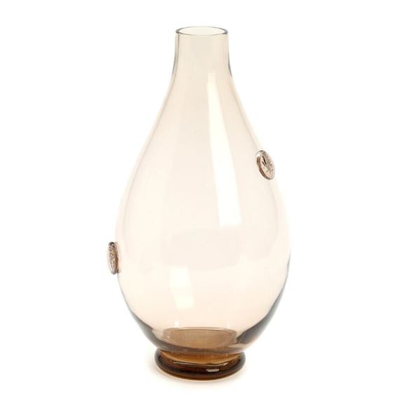 A smoke coloured glass vase with added seals