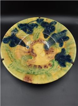 Important hollow dish in stoneware with decoration of flowers and a female face. - Arthur Craco