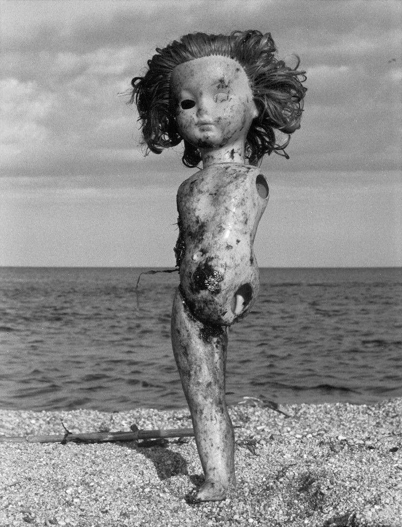 Artwork by Pierre Boucher, Doll on the beach, Made of Photograph. Posterior silver print