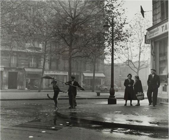 Street scene with sweeper and dog