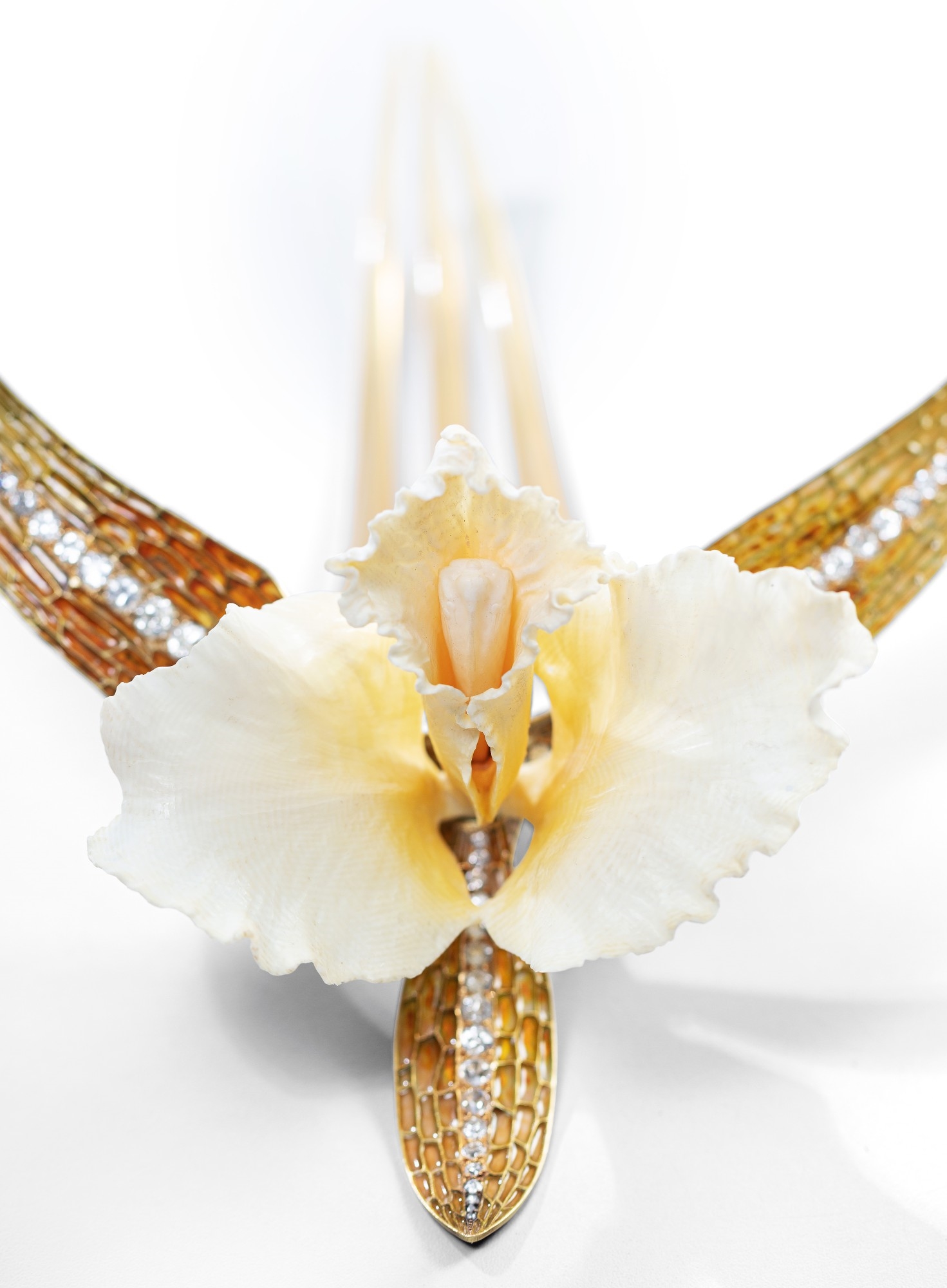 Artwork by René Lalique, Ivory, horn, enamel and diamond comb, 'Cattleya', Made of Ivory, horn, enamel and diamond