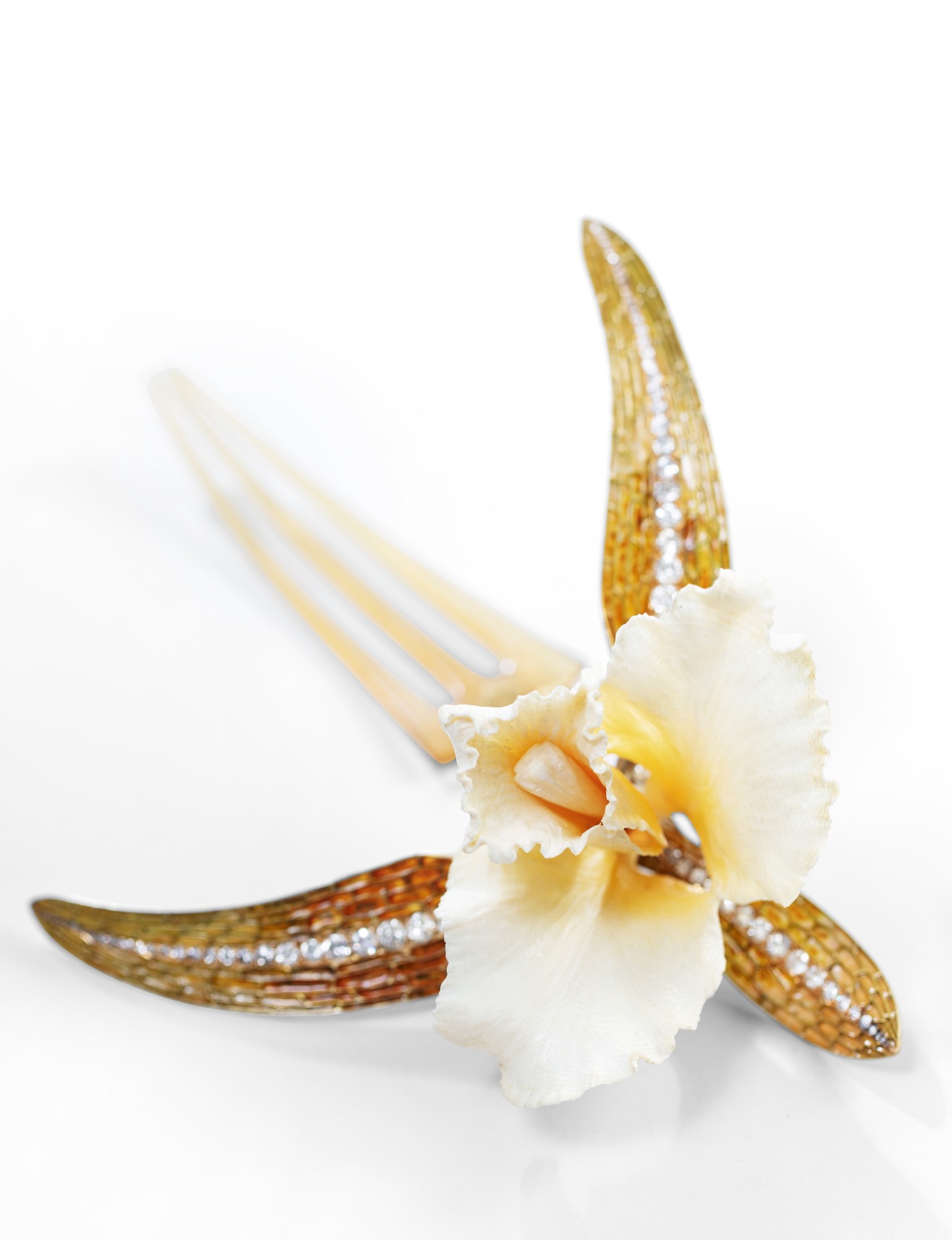 Artwork by René Lalique, Ivory, horn, enamel and diamond comb, 'Cattleya', Made of Ivory, horn, enamel and diamond