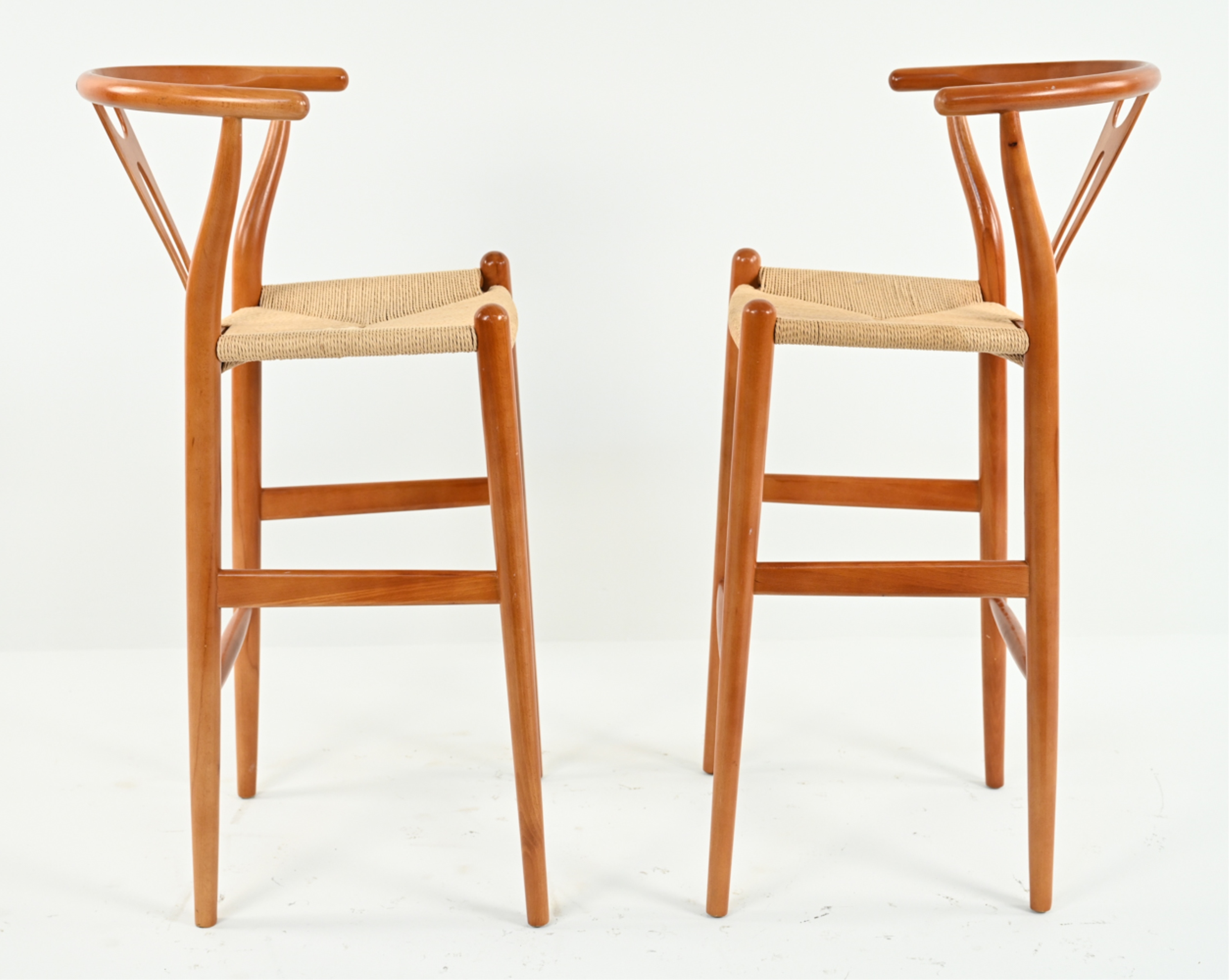 Hans J. Wegner | PAIR CONTEMPORARY WEGNER-STYLE WISHBONE BAR STOOLS