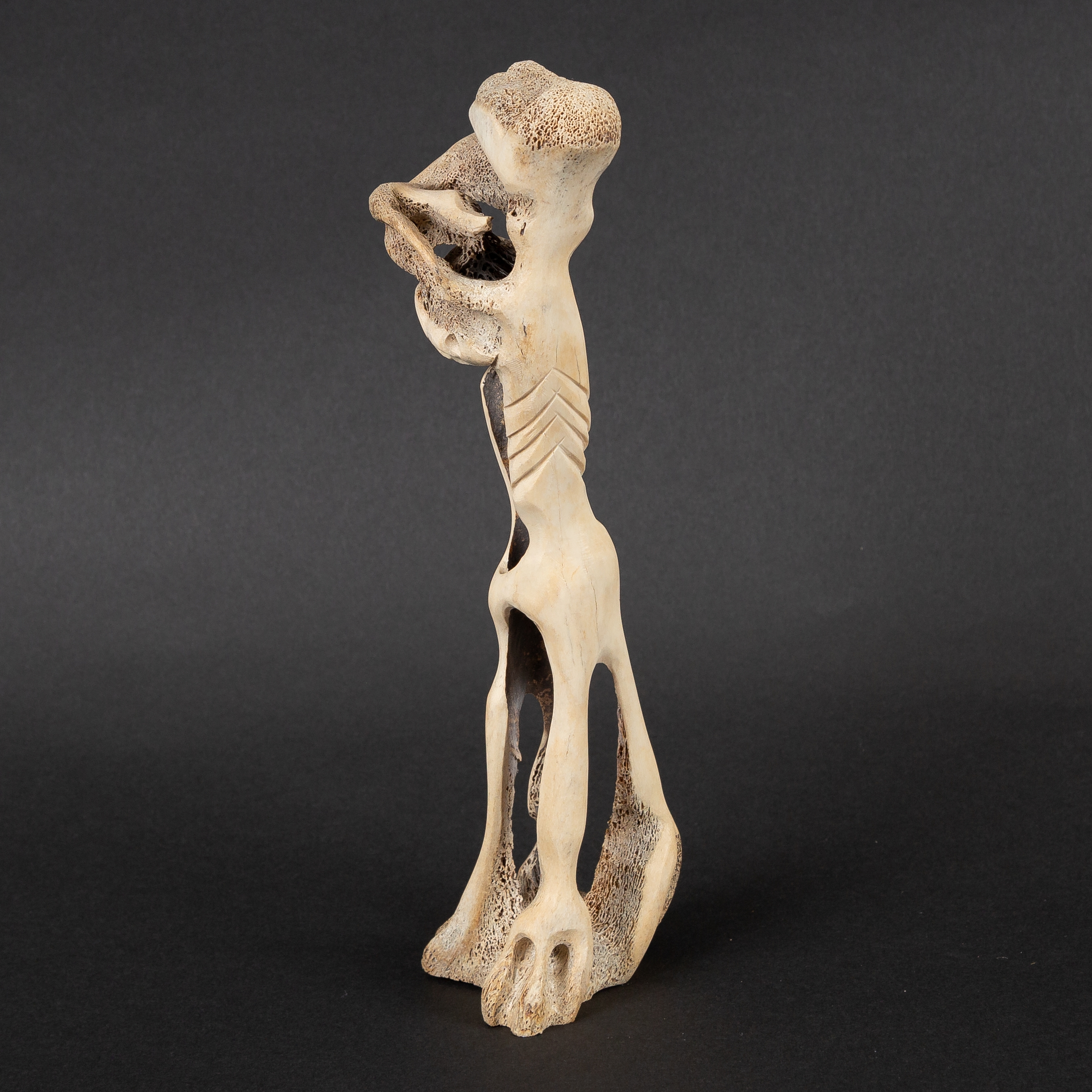 Artwork by Alex Alikashuak, ABSTRACT FIGURE, Made of whalebone