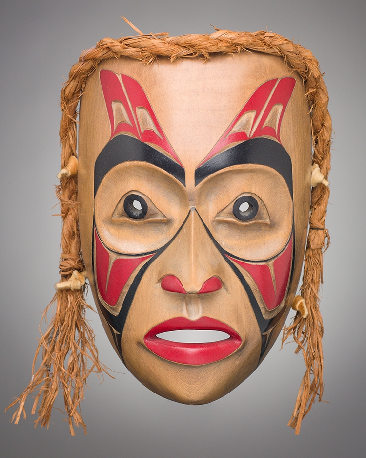 Artwork by D. Helifton, Mask, Made of carved cedar, bark, acrylic
