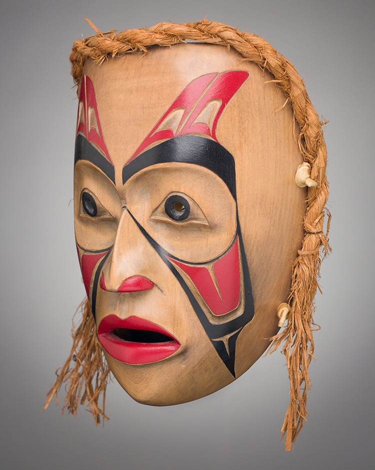 Artwork by D. Helifton, Mask, Made of carved cedar, bark, acrylic