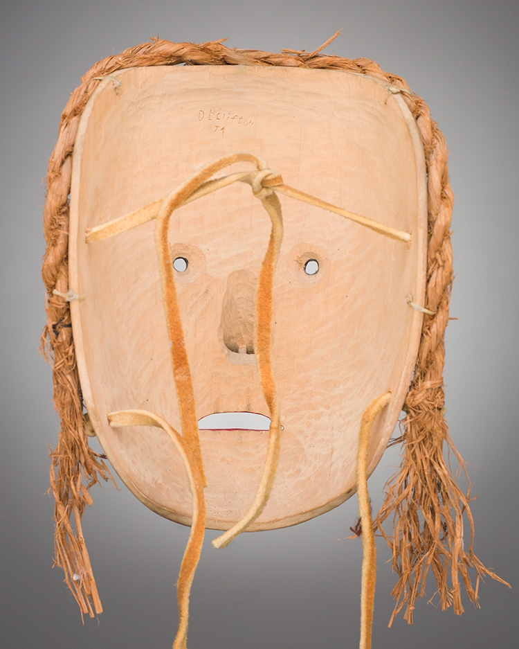 Artwork by D. Helifton, Mask, Made of carved cedar, bark, acrylic
