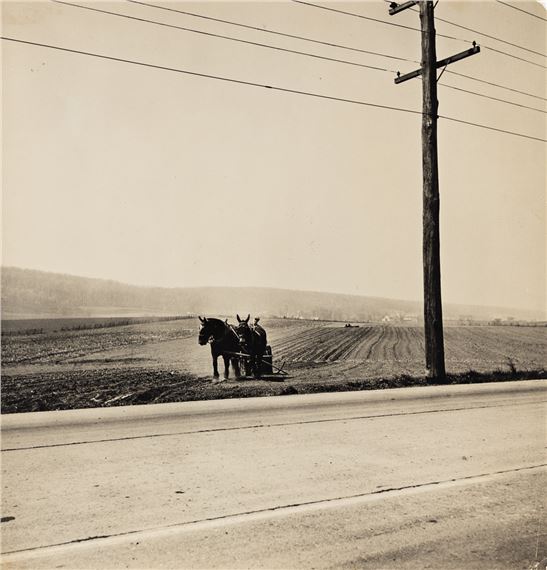 Farm, road, and telephone lines. by Gordon Parks, Circa 1950