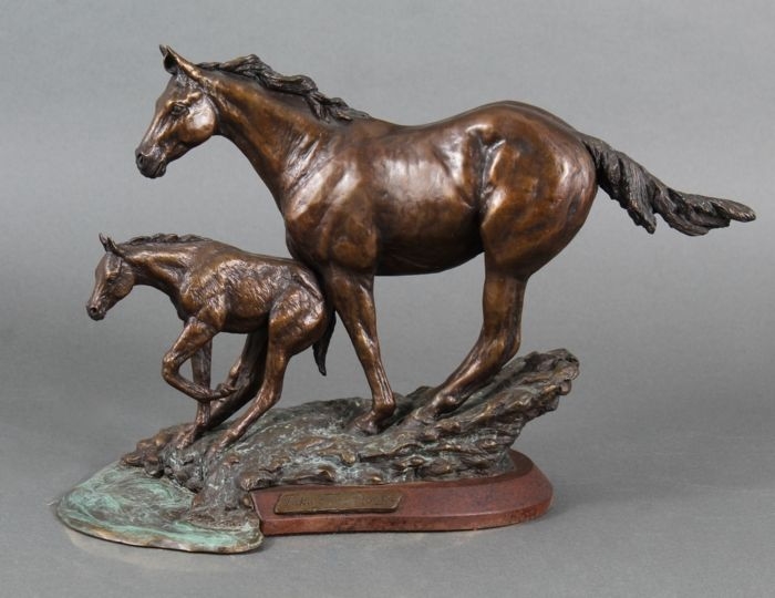 Artwork by Suzann Fiedler, Taking the Plunge, Made of Bronze on mahogany finish base