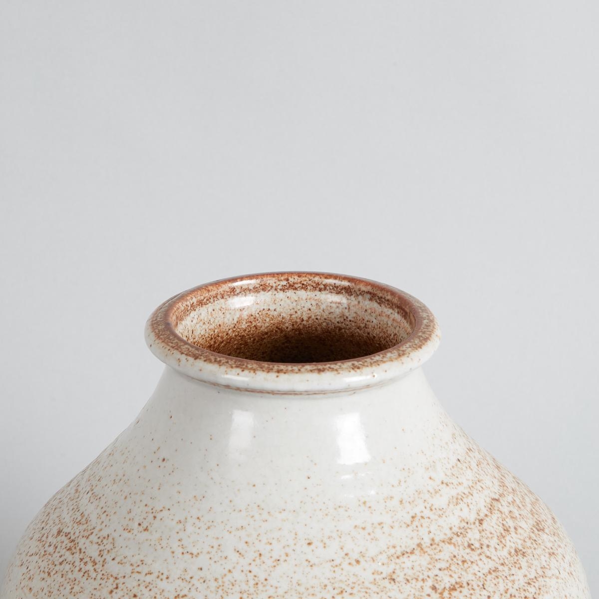 Artwork by Mike Spencer, Lynn Spencer, A Mike and Lynn Spencer Shino Floor Vase, Made of cream coloured glaze with red