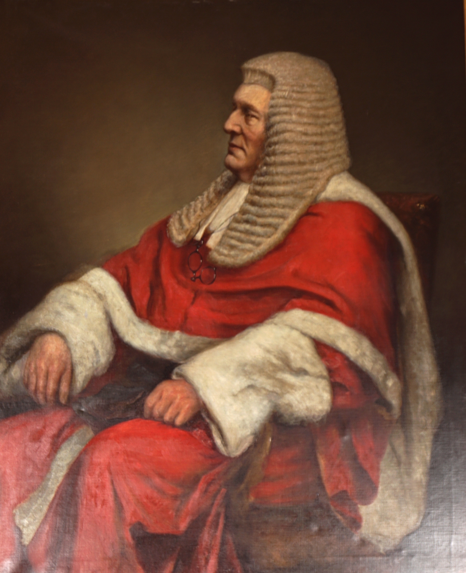 Artwork by Emilie Sheen, Three-quarter length portrait of a seated judge wearing a red robe, Made of oil on canvas
