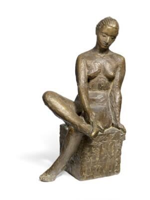 Seated woman by Knud Nellemose