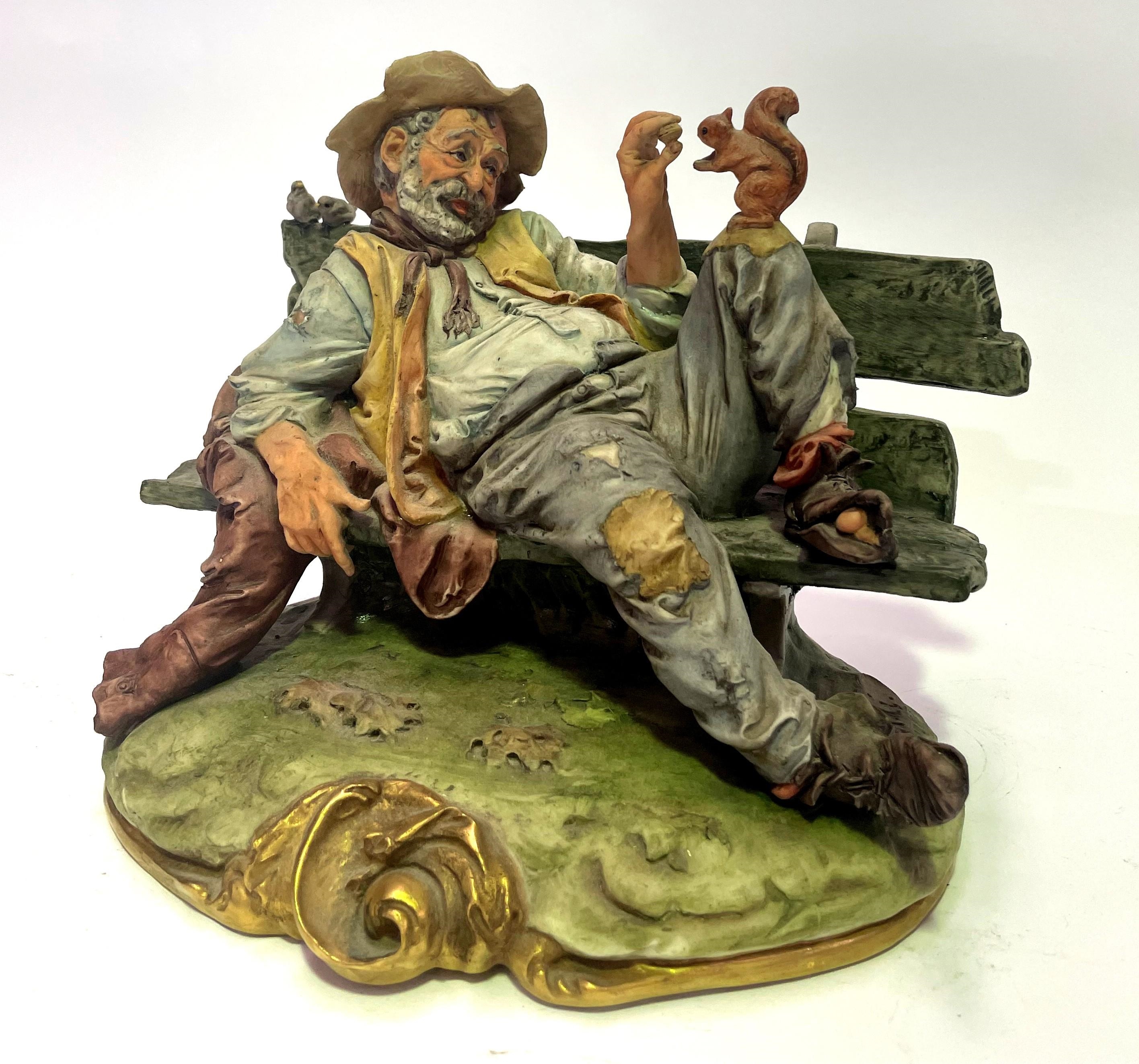 B. Merli | A Capodimonte, Italy Ceramic Figure of a Tramp Feeding a ...