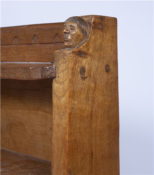 Whittaker | Oak bookcase, with two carved monk`s head terminals, with ...