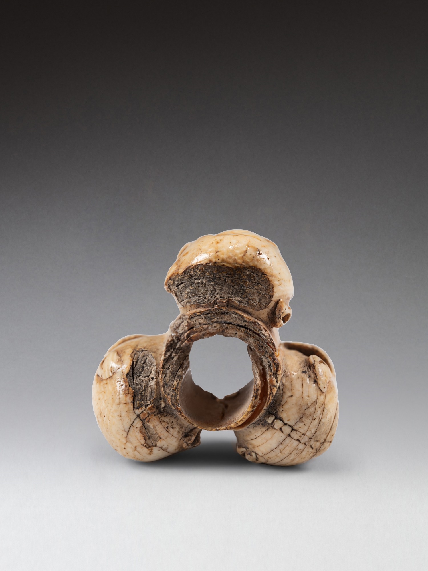 Flemish School, 15th Century | A rare ivory bead with three heads, from ...