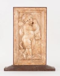Bas-relief au motif d'un amour ailé. Signé: Godecharle - Gilles-Lambert Godecharle