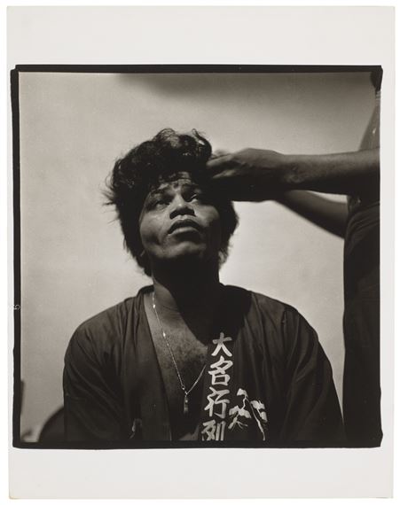 James Brown at home in curlers, Queens, N.Y., 1966 by Diane Arbus, 1966