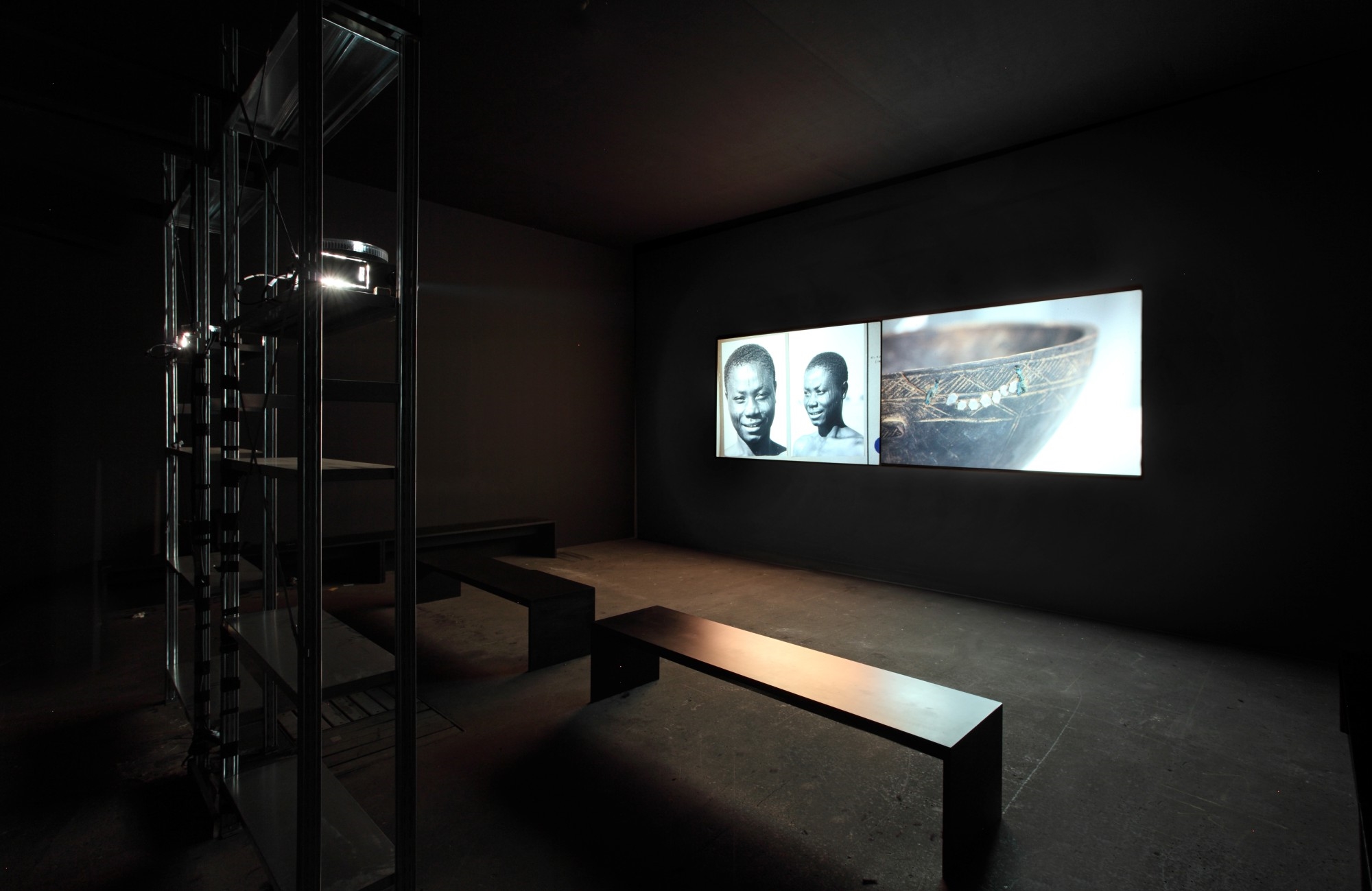 Artwork by Kader Attia, The Repair, Made of two channel slide projector, diptych of 80 slides