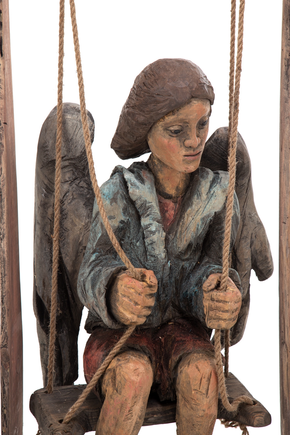 Artwork by Marcin Mysliwiec, Angel On A Swing, Made of wood
