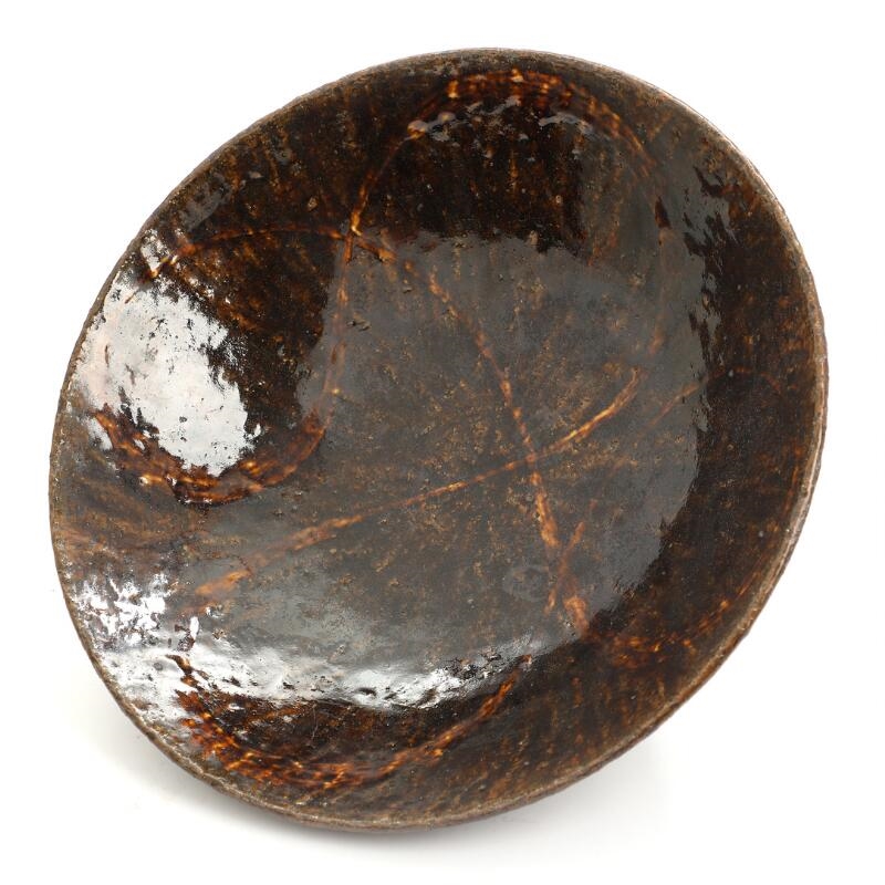 Artwork by Eigil Hinrichsen, A stoneware bowl, Made of dark brown glaze with