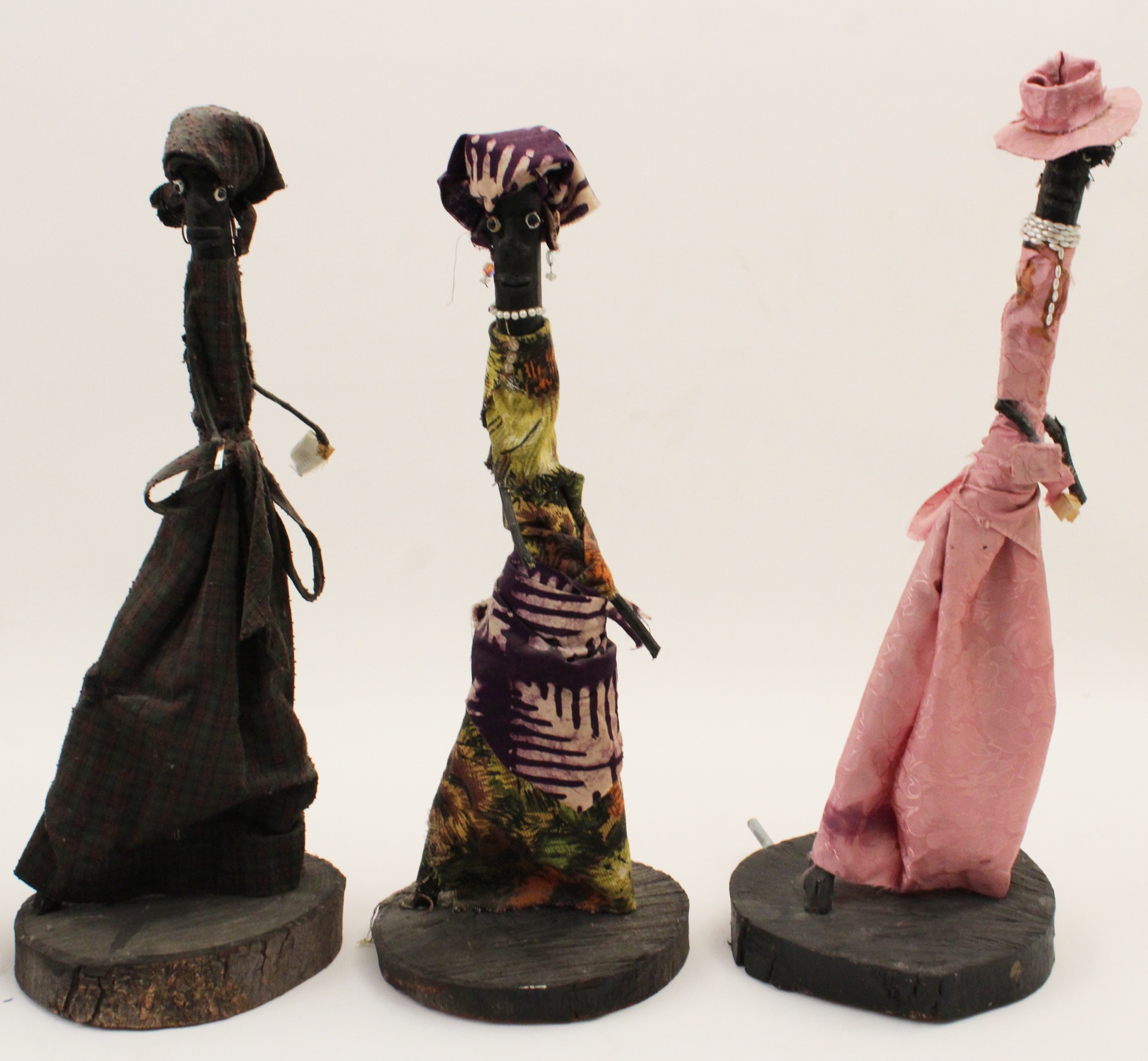 Artwork by Bessie Harvey, Seven Days of the Week, Made of polychrome wood with applied fabric cloth