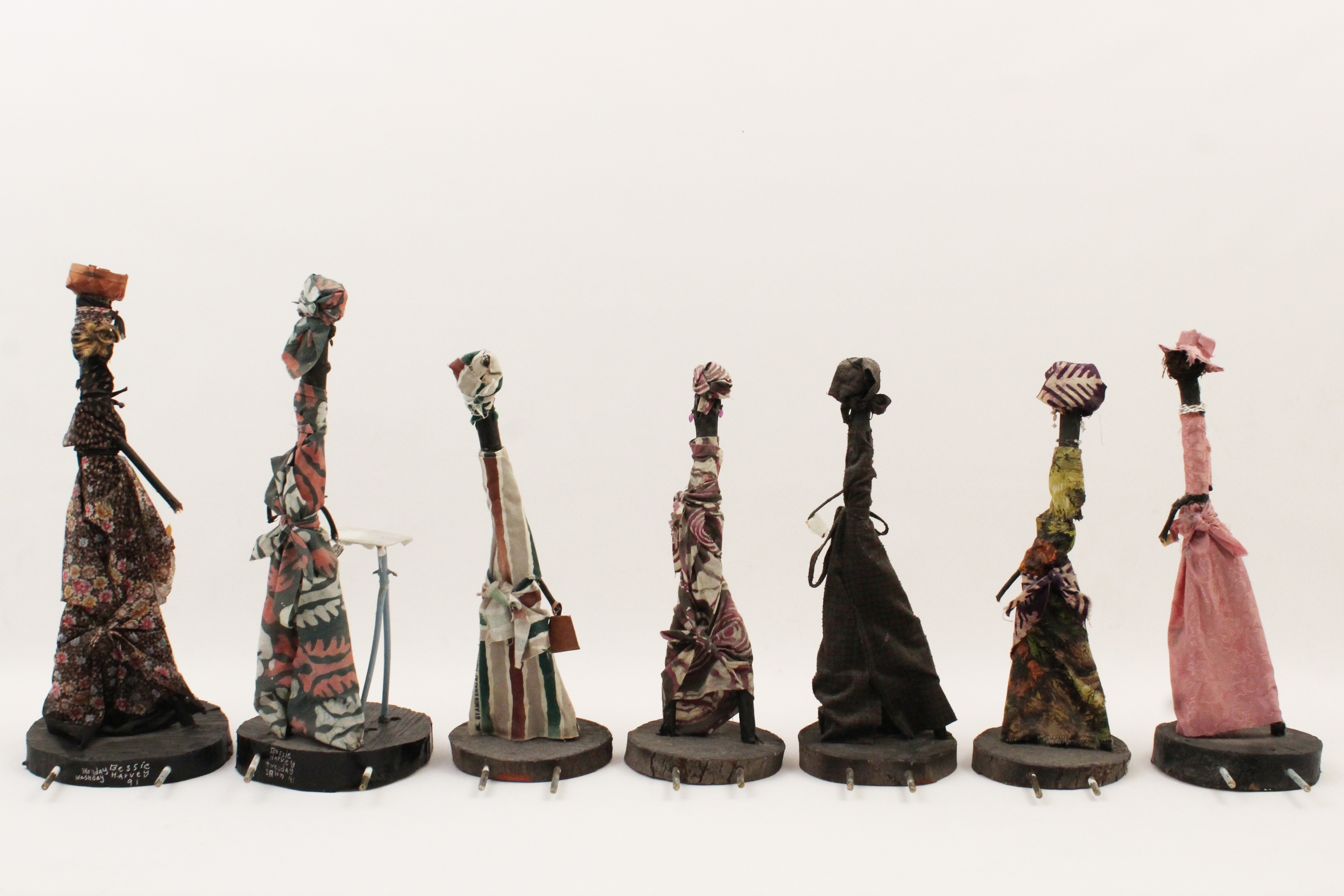 Artwork by Bessie Harvey, Seven Days of the Week, Made of polychrome wood with applied fabric cloth