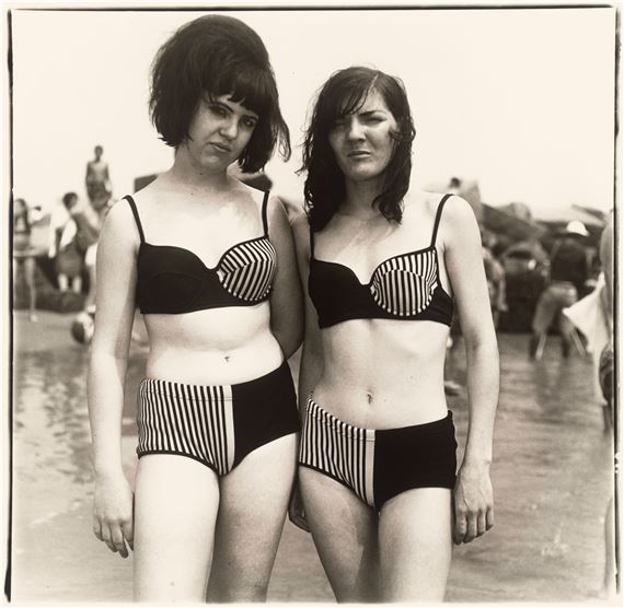 Two Girls in matching Bathing Suits, Coney Island, N.Y. by Diane Arbus, 1967