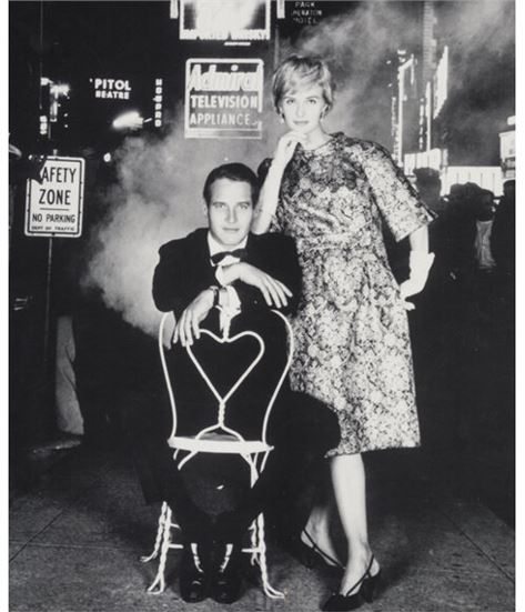 Paul Newman and Joanne Woodward in Times Square by William Helburn, 1960