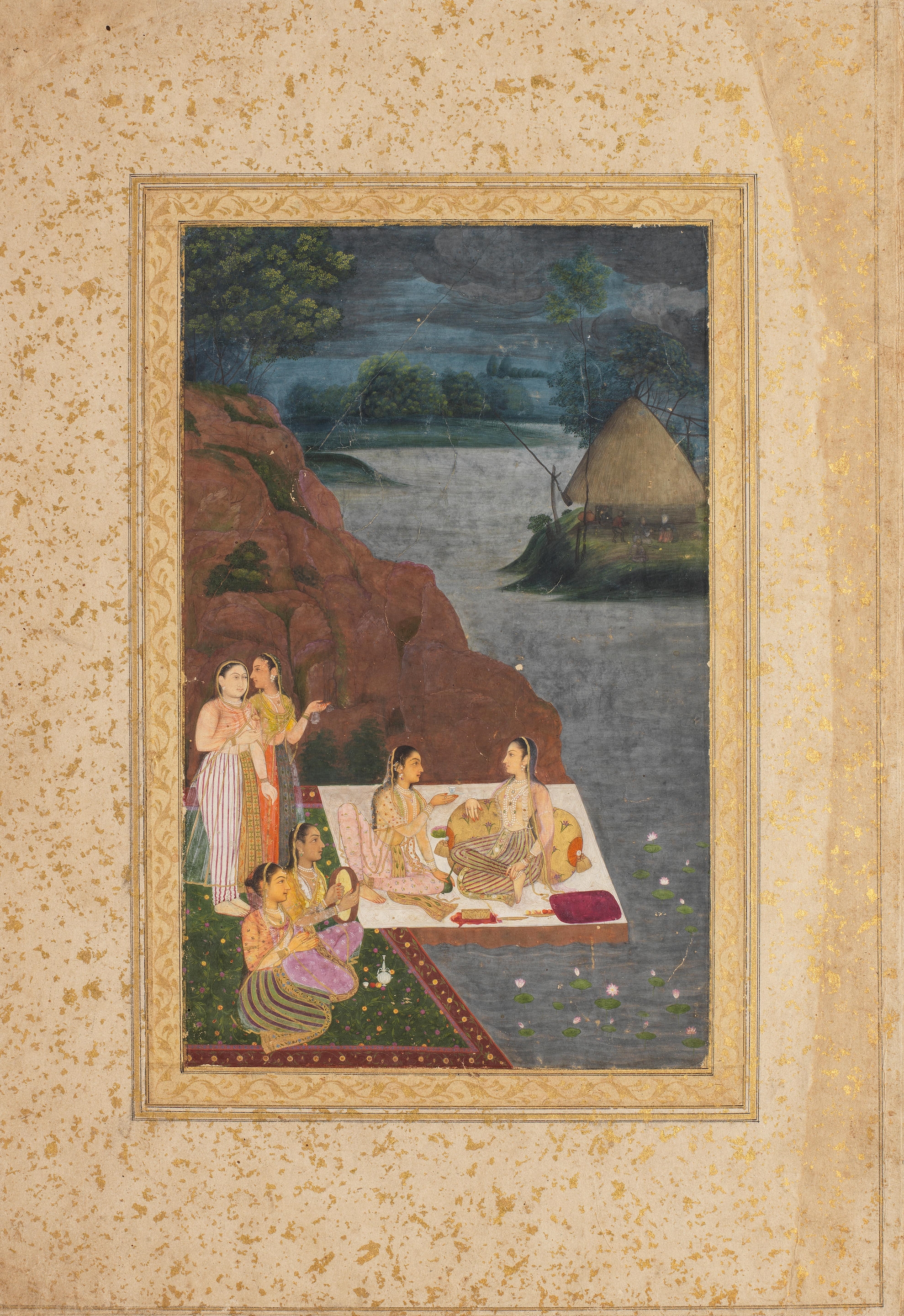 Maidens at leisure on a riverbank, fishermen beyond on the opposite bank by Mughal School, 18th Century, circa 1760-80