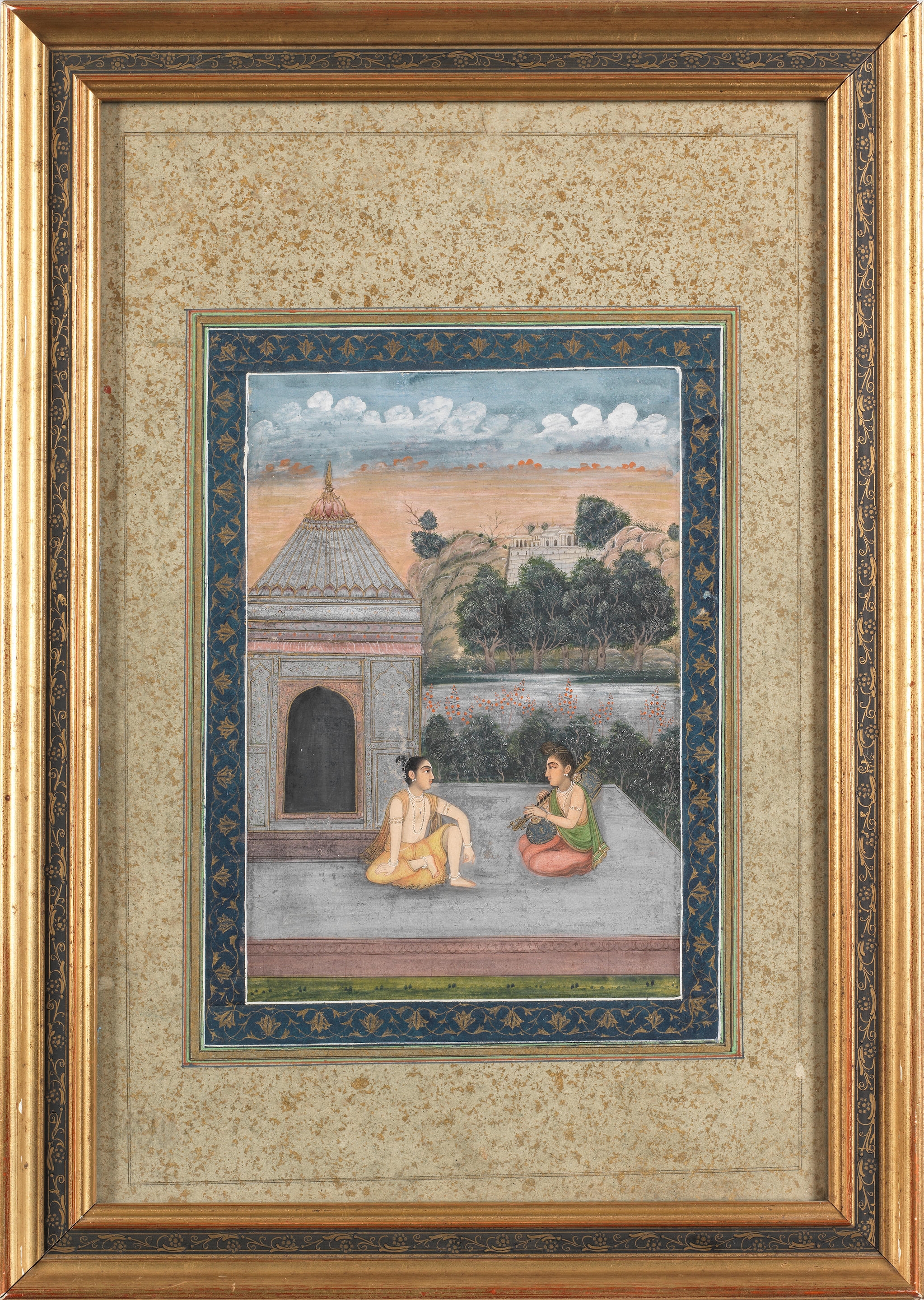 Kedar ragini : a noble devotee seated on a terrace beside a pavilion, listening to an ascetic playing a vina by Mughal School, 18th Century, circa 1780