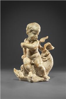 A MARBLE GROUP OF A PUTTO ON A DOLPHIN - French School, 18th Century