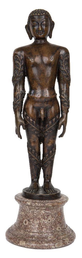 Lot - A bronzed pottery bust of an Indian brave. 19 3/4 in. (50 cm)