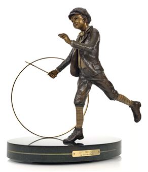 A dynamic bronze statue of a figure in mid-motion, captured in a moment of playful energy.