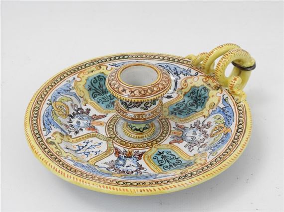 Polychrome earthenware hand candlestick decorated with four alternating grimacing masks by Ulysse Besnard, dated April 1886