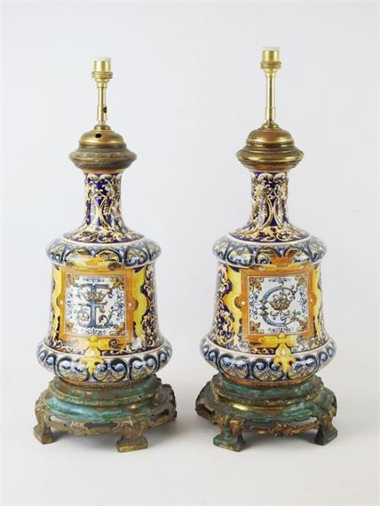 Pair of  lamps decorated with cartouches adorned with royal monograms on a background of foliage scrolls