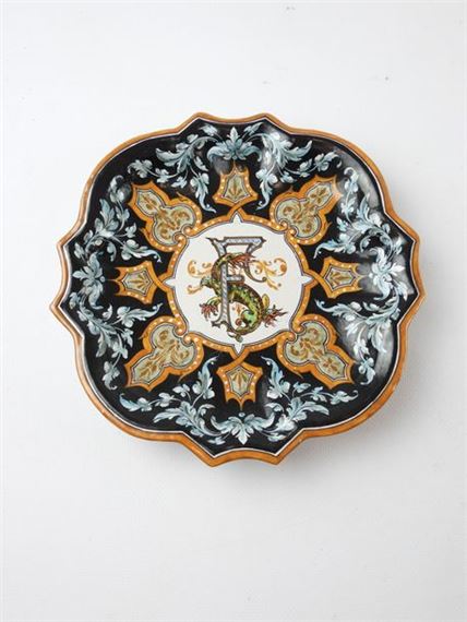 Polylobed earthenware plate decorated with a salamander entwined with the letter F by Ulysse Besnard, dated 1877