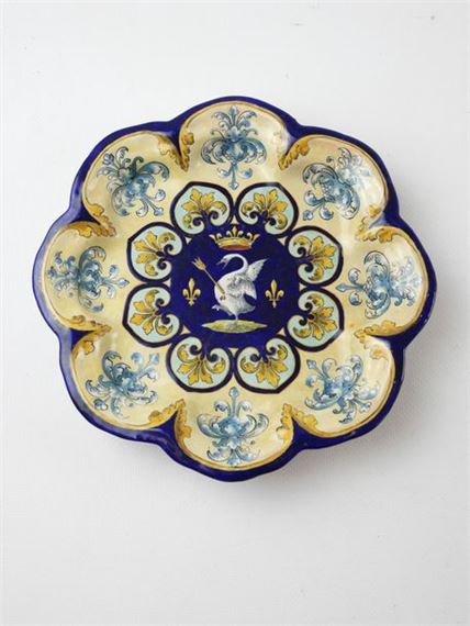 Polylobed earthenware plate decorated with a pierced swan by Ulysse Besnard, dated 1886
