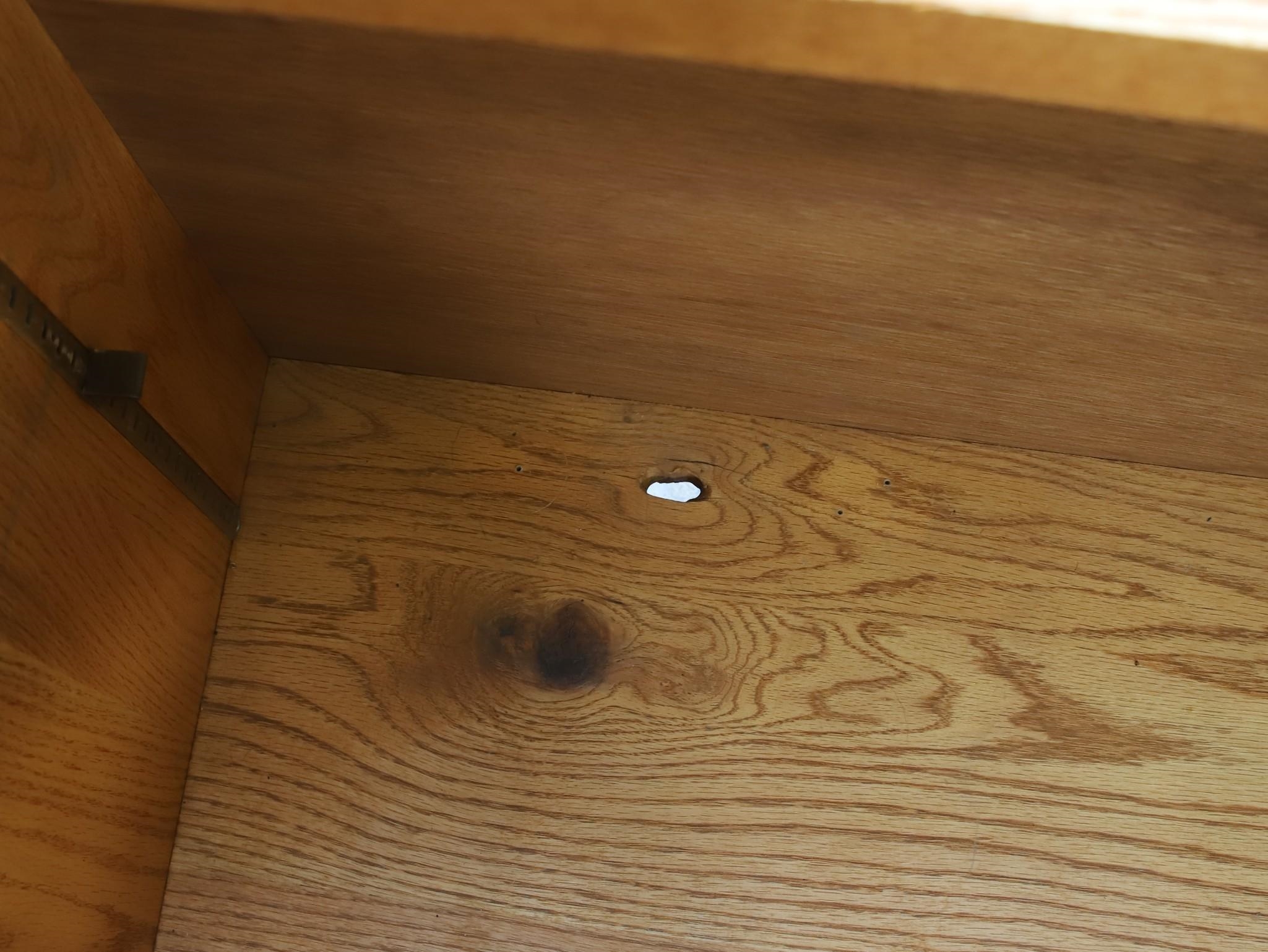 Gino Russo four chipcarved chiseled doors opening to shelving and a