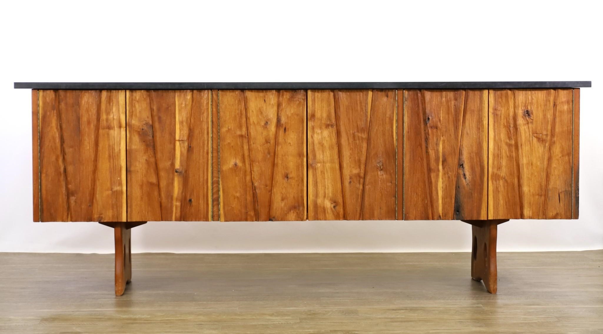 Gino Russo four chipcarved chiseled doors opening to shelving and a