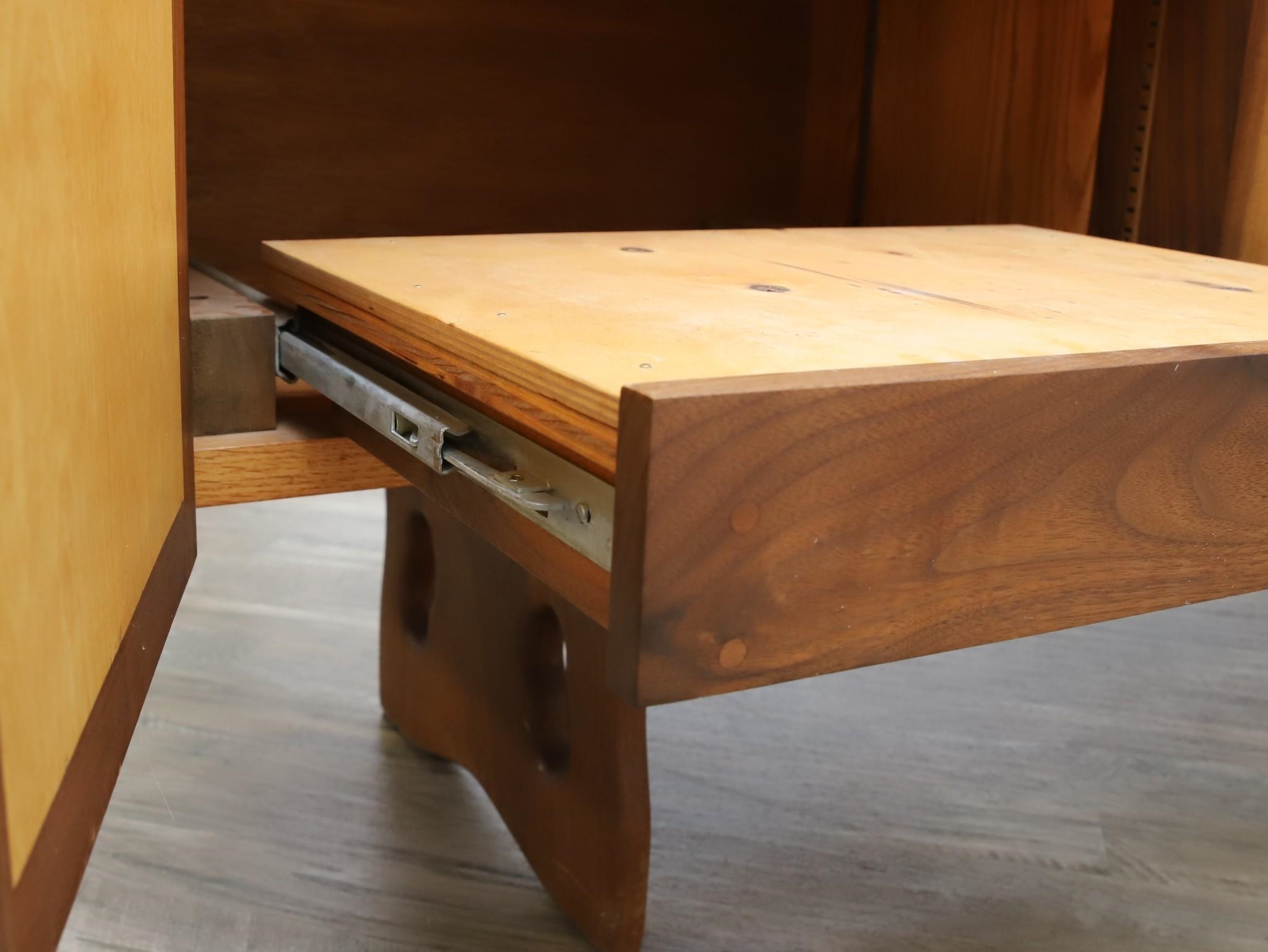 Gino Russo four chipcarved chiseled doors opening to shelving and a