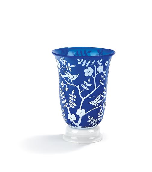 a vase with blooming branches and birds by Otto Prutscher, 1925