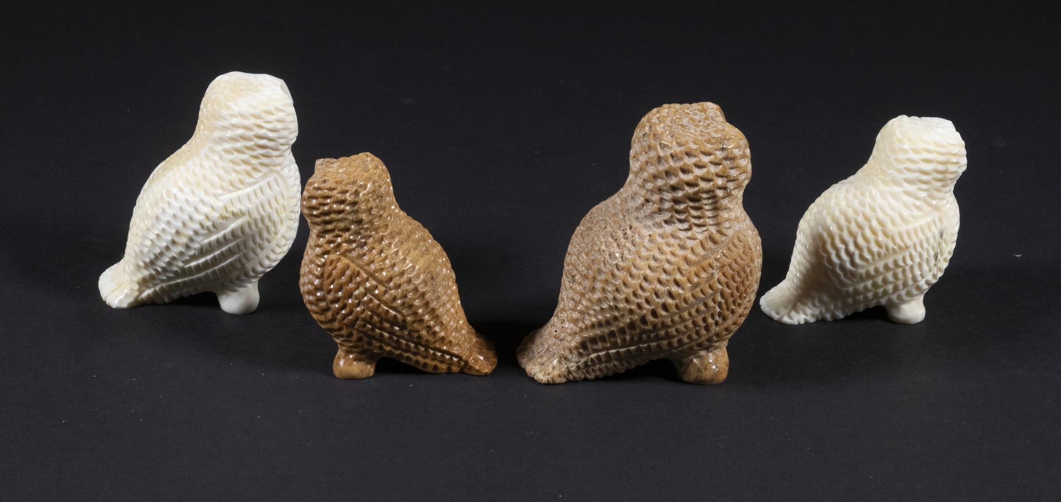 Artwork by Bert Oozevaseuk, INUIT SCULPTURES OF OWLS, Made of carved walrus ivory, bone and baleen
