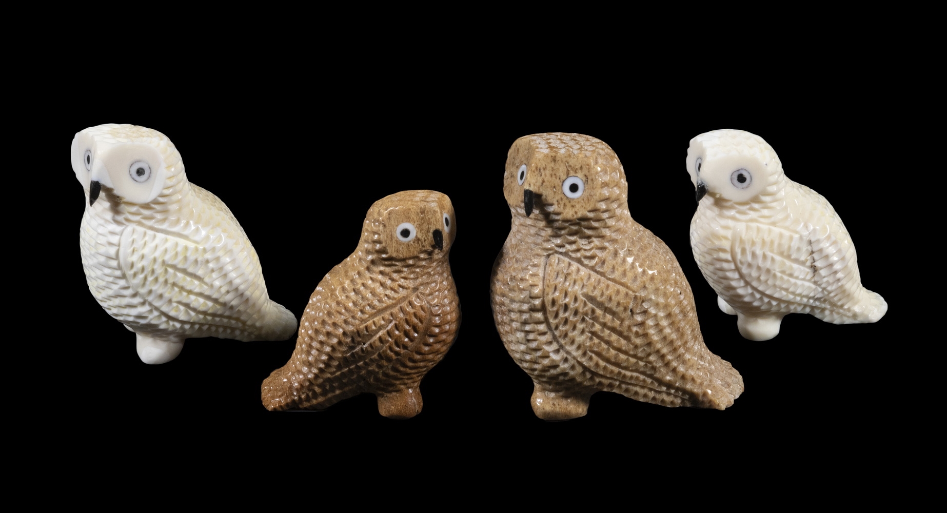 Artwork by Bert Oozevaseuk, INUIT SCULPTURES OF OWLS, Made of carved walrus ivory, bone and baleen