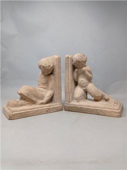 Pair of bookends in terracotta, representing a kneeling faun and a seated faun. - Gaston Deblaize
