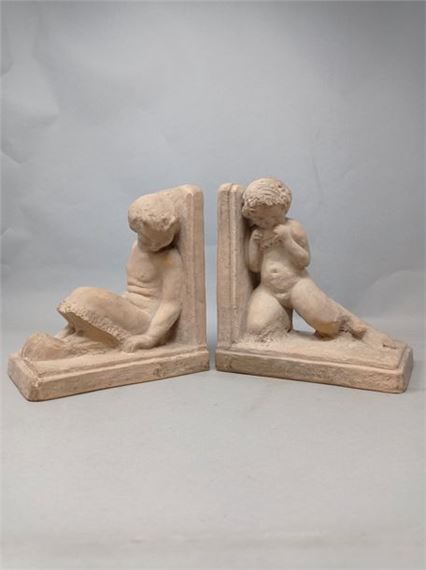 Pair of bookends in terracotta, representing a kneeling faun and a seated faun. - Gaston Deblaize