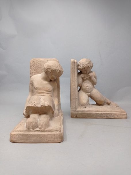 Artwork by Gaston Deblaize, Pair of bookends in terracotta, representing a kneeling faun and a seated faun., Made of terracotta